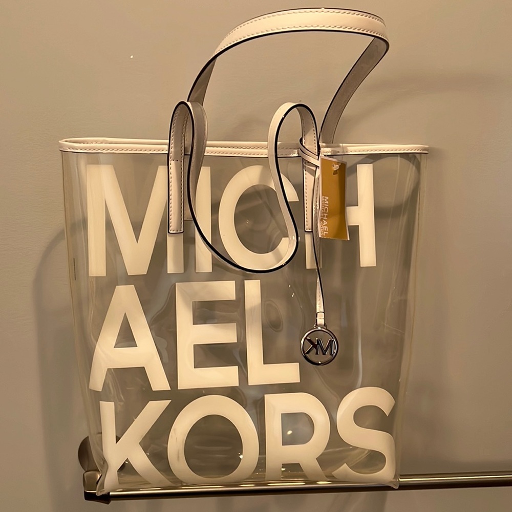 NWT Michael Kora graphic clear tote bag.  Clear with white lettering.